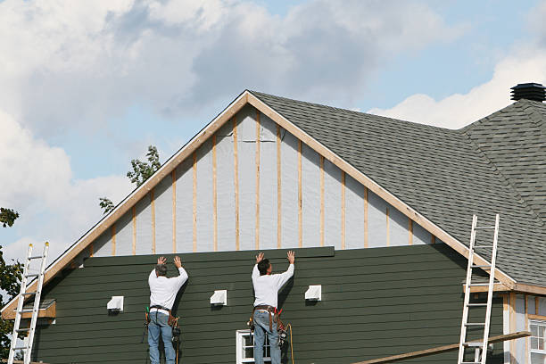 Professional Siding Installation technician working in Rector, PA